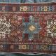 Antique tribal Caucasian Kazak rug