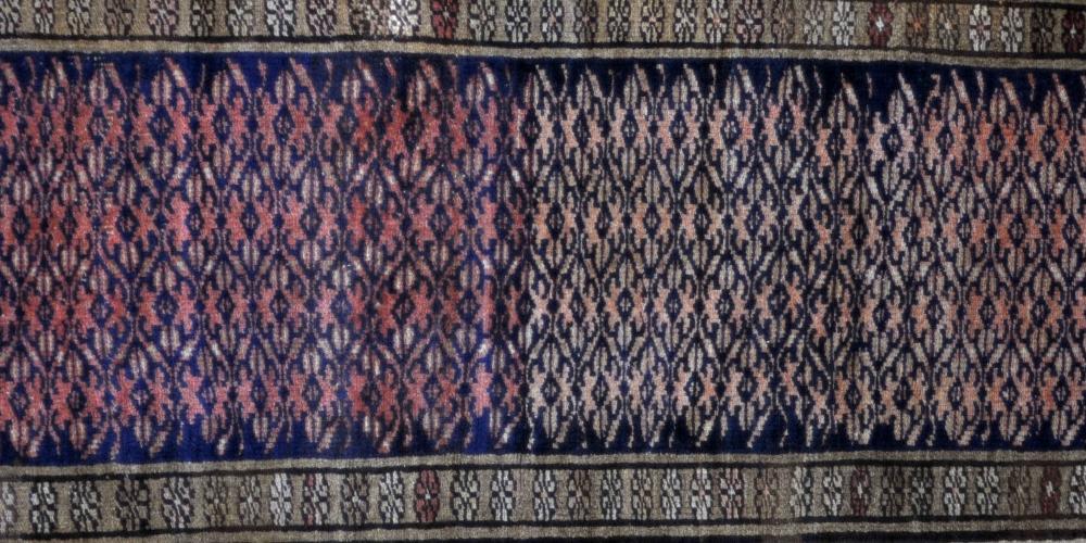 old or antique caucasian tribal rug