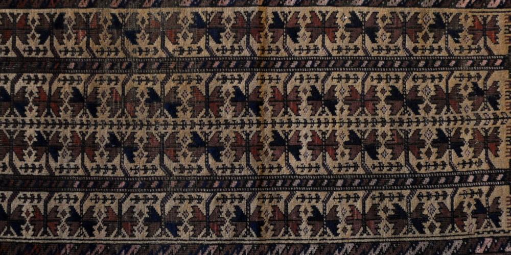 Old or antique Baluch Afghan tribal rug