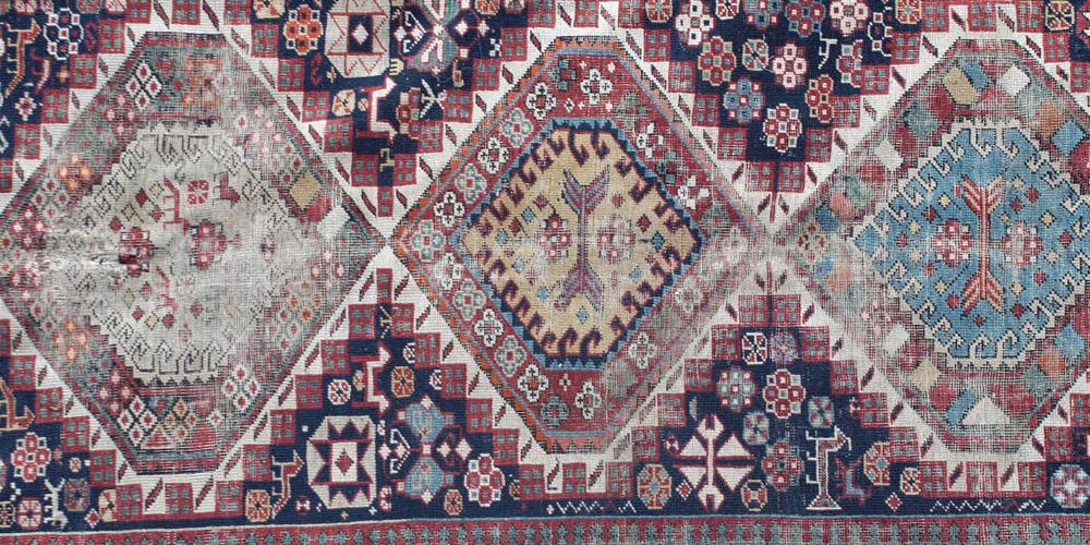 Antique Kazak Rug
