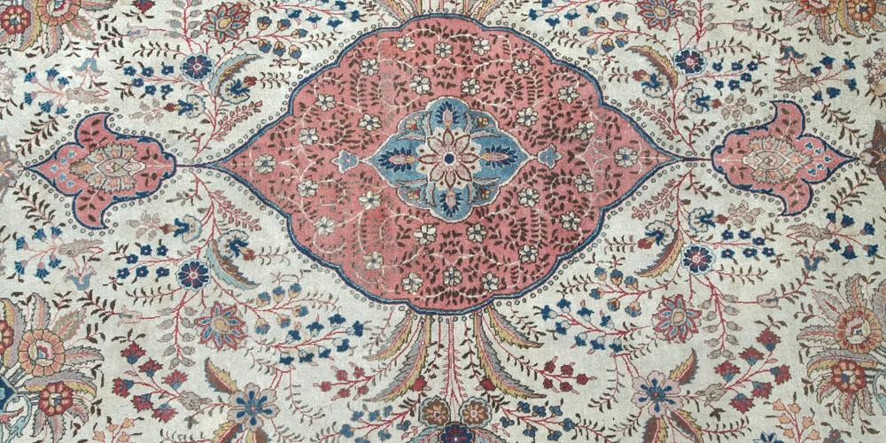 Old or antique Tabriz Persian carpet