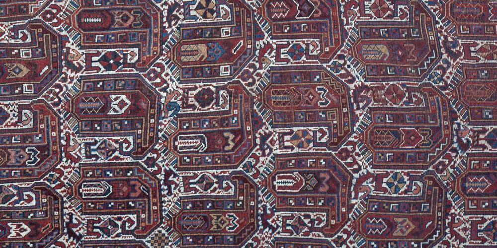 Antique Kamseh tribal Persian rug