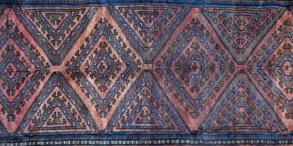 Antique Baluch Afghan tribal rug
