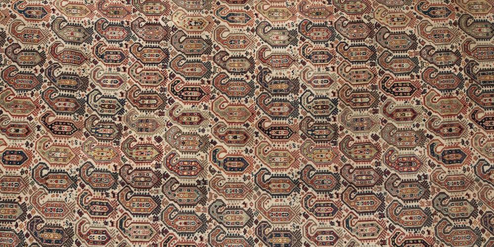 German Machine made carpet in Persian design
