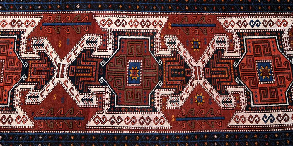 Antique of old Caucasian Kazak runner