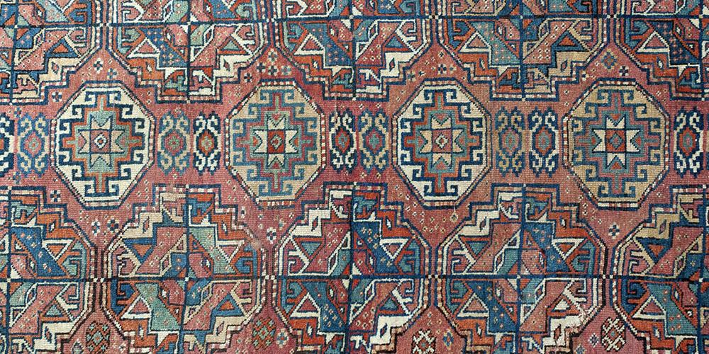 Antique Kazak Caucasian Rug in Tekke design