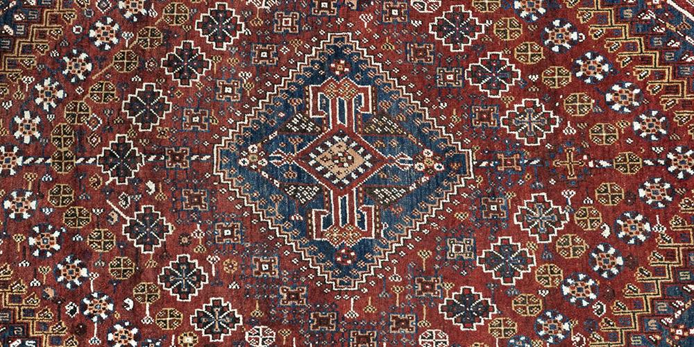 Old or antique Qashqa'i Tribal Persian rug