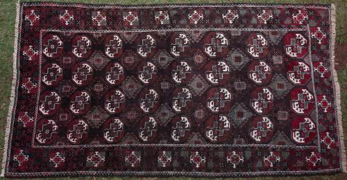 Old Baluch Afghan or Persian Tekke design rug