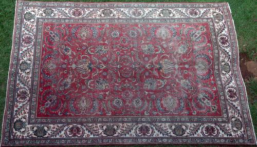 Old or antique Tabriz Persian carpet