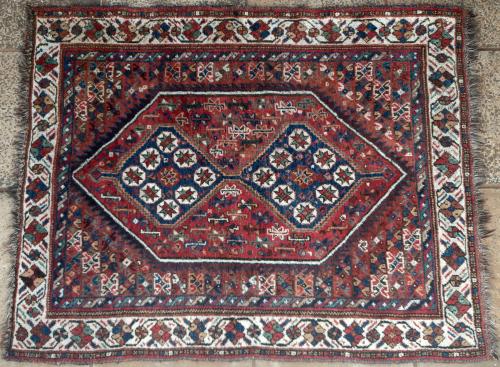 Old or antique Qashqa'i tribal Persian rug