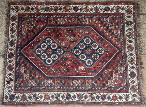 Old or antique Qashqa'i tribal Persian rug